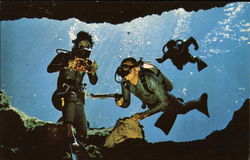 Divers demonstrate underwater scuba equipment in the crystal clear water of Florida Silver Springs, FL Postcard Postcard Postcard