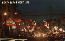 North Beach - Broadway and Columbus at Night Postcard