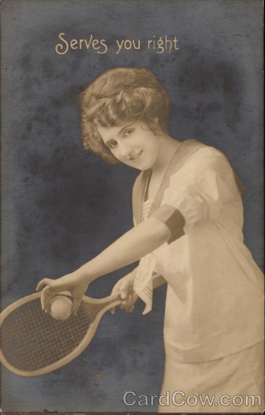 Woman Serving Tennis Ball