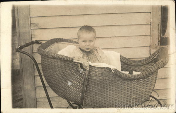 Child In Wicker Buggy Children