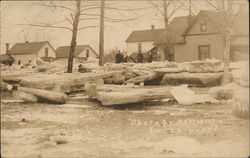 Sheets of Ice Melting by Residences Postcard