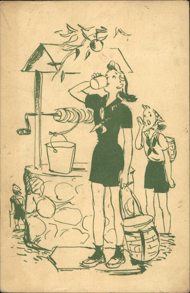 Two Girl Scouts drinking from a well at camp