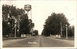 Water Tower And Main Road In Alma Postcard