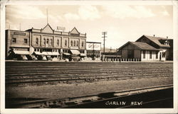 Colonial Hotel and Raiway Tracks Postcard