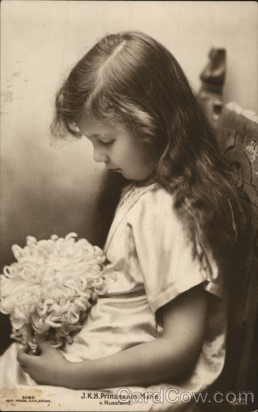 Pretty Long-Haired Young Girl Seated Girls