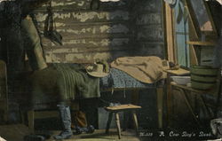 A cowboy's bunk - hat on a bed with boots next to it Postcard