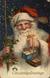 Christmas Greetings - Santa holding gifts Postcard