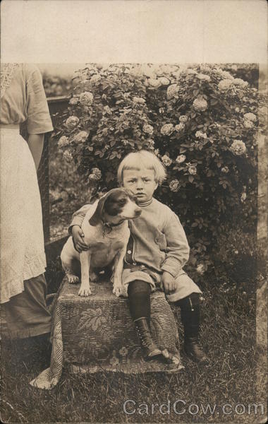 Boy Posing with His Dog in the Garden Boys
