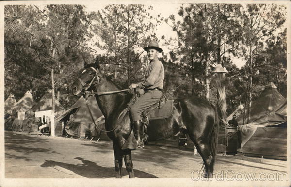 Soldier in Camp Posing on a Horse People in Uniform