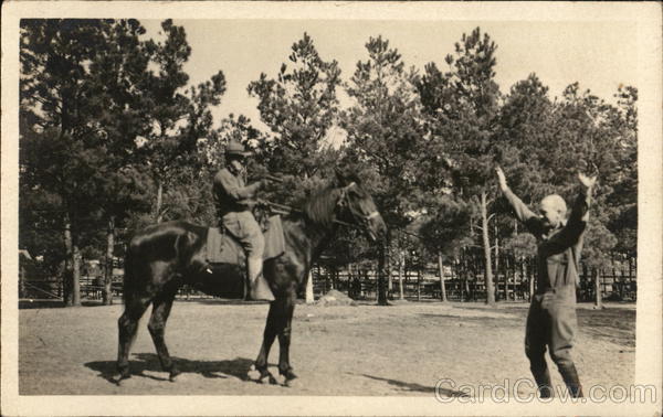 Soldier on Horseback Holding Man at Gunpoint People in Uniform