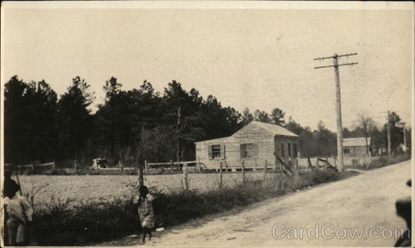 Girls Walking Down Country Road