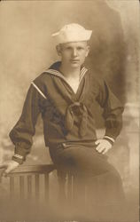 A Sailor Leaning Against the Back of a Chair A Sailor Leaning Against the Back of a Chair