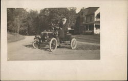 Man and Woman in Car Postcard