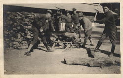 Men Chopping Firewood Men Chopping Firewood