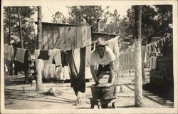 US Soldier Hanging Laundry to Dry Postcard
