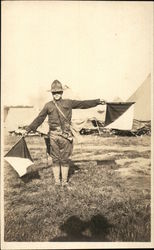 Soldier Demonstrating Semaphore in Camp Postcard