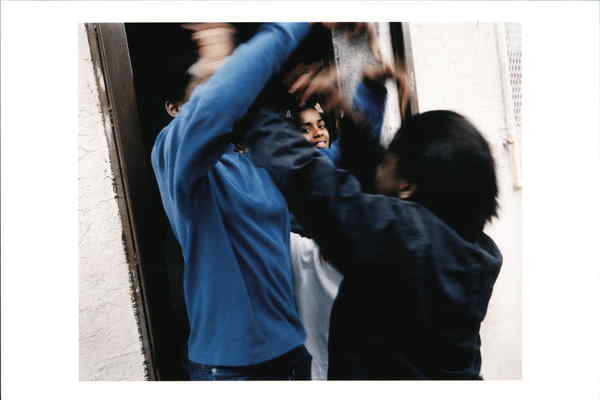 Girls playing on Germantown Avenue Philadelphia Pennsylvania