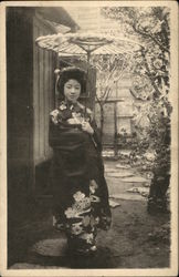 A young Japanese woman wearing typical dress A young Japanese woman wearing typical dress