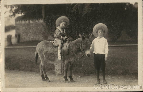 Two Children and Donkey Donkeys