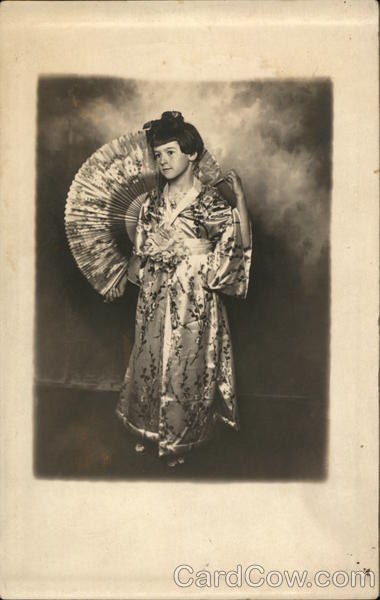 A girl dressed in kimono Children