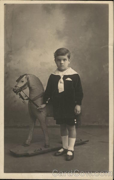Portrait of Boy With Toy Horse Boys