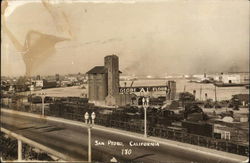 Grain Elevator in Foreground, Sign: Globe "A1" Flour Grain Elevator in Foreground, Sign: Globe "A1" Flour