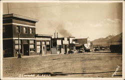 Street Leven Scene of Buildings and Cars Postcard