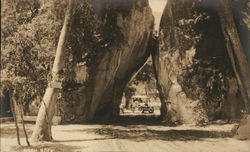 Driving Between Arch Rock Postcard