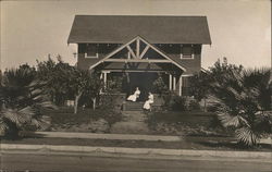Two Women on House Porch Postcard