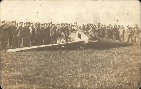 Soldiers standing by the crushed plane. Russia