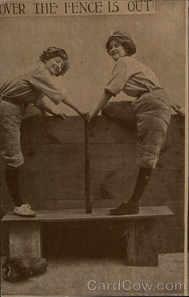 Women in Baseball Uniforms Straddling Fence