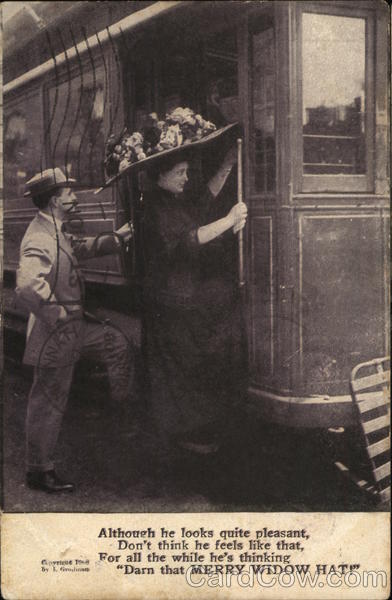 Man Behind Woman in Large Hat Climbing Aboard Train
