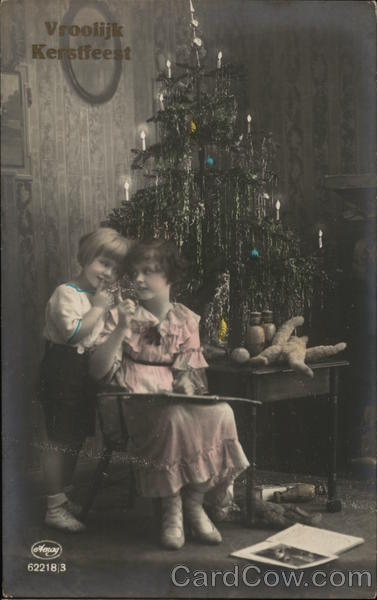 Children by Christmas Tree