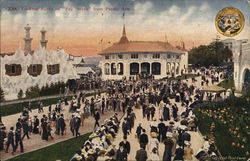 Amusement Park Attractions and Large Crowd of People Amusement Park Attractions and Large Crowd of People
