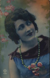 Young Woman With Brown Hair Wearing Green Necklace Postcard