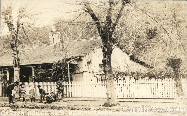 A Group of Children Gathered Outside a House