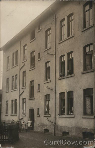 People at Windows in 3-Story Building, Children in Front Nurenberg Germany