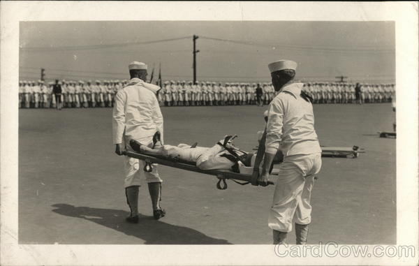 Two Sailors Carrying a Sailor on a Stretcher Navy