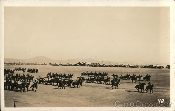 Soldiers on Horseback in Formation on Large Field Military
