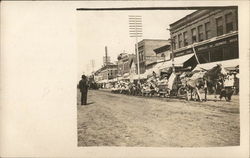 Parade Passing the Sheakley and Kennedy Bros. Department Store New Hampton, IA Postcard Postcard Postcard