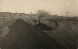 Locomotive Pulling Train Postcard