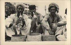 Three Snake Charmers with Horns, Baskets and Snakes Rising Pakistan Postcard Postcard Postcard