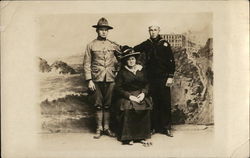 A Soldier and a Sailor Posing with an Older Woman Postcard