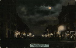 Night Scene, Looking East from Main on Washington Postcard