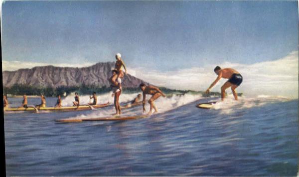 Surfers Ride The Surf Off Waikiki Beach Surfing and Waterskiing