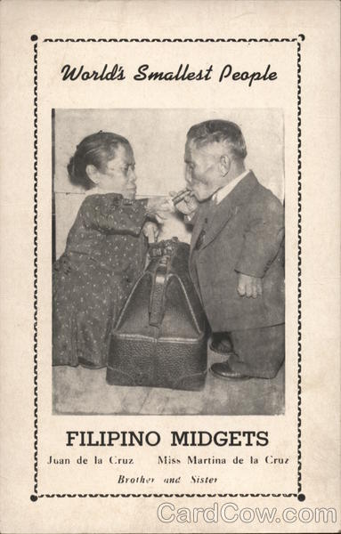 Filipino Midgets: Small Woman Lighting Cigar for Small Man