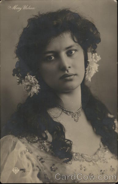 Mary Urban - Dark-Haired Woman with Flowers in Hair