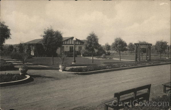 One-Story House with Sprawling Lawn and Landscaping