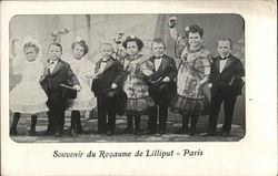 Four Well Dressed Couples of Little People in a Lineup Postcard