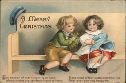 A Merry Christmas - Two Young Children Seated on Bench Postcard
